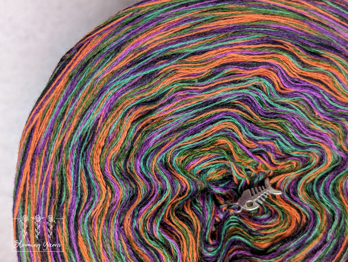 Melange merino/acrylic blend yarn cake with sequins MA027