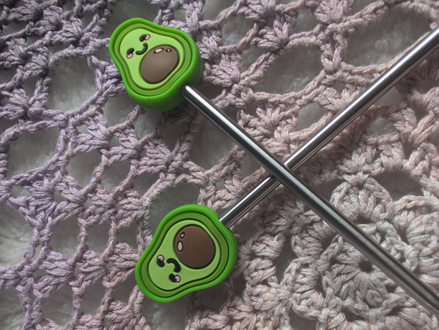 Pair of knitting needle stoppers