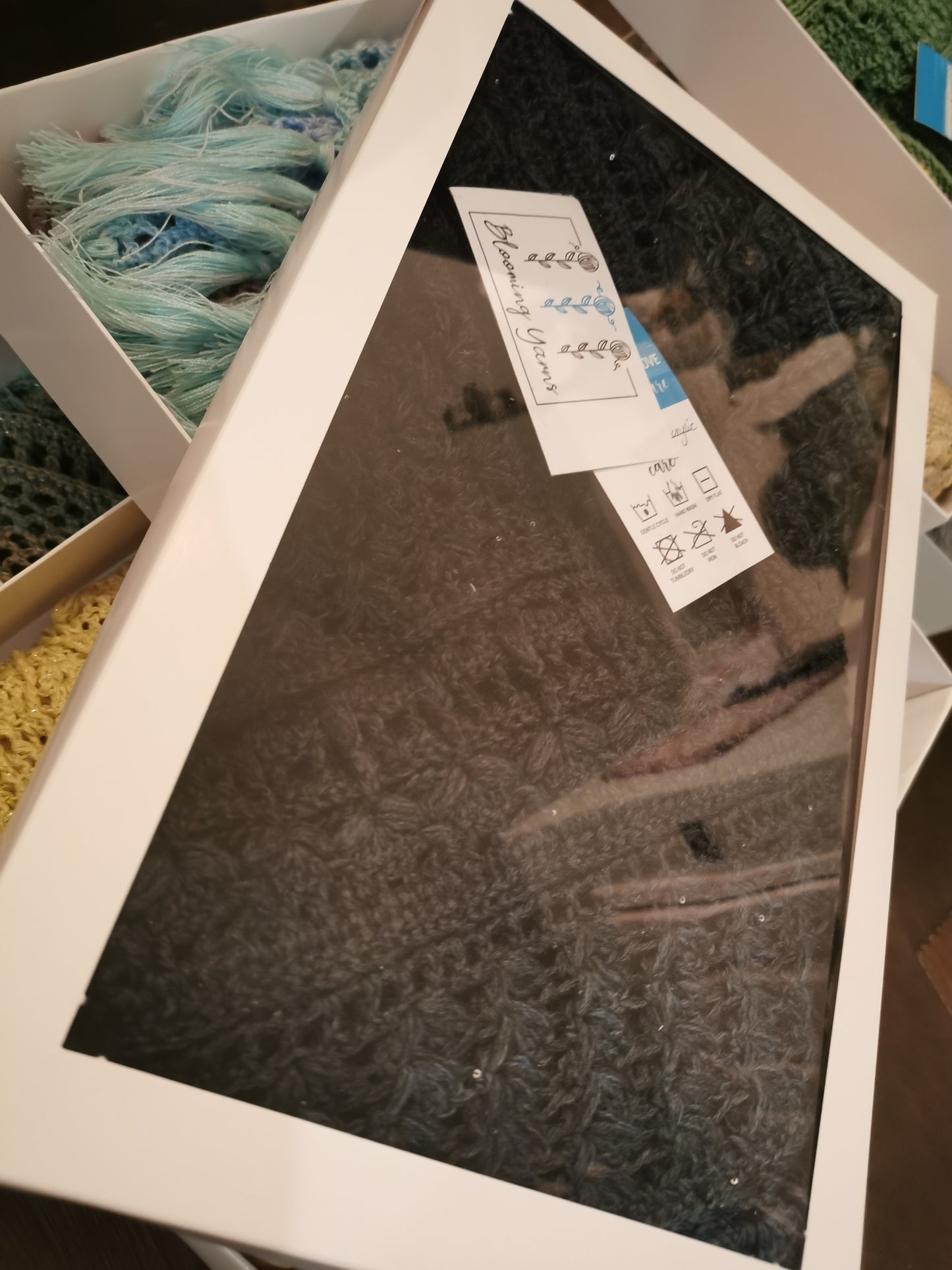 White cardboard box with window lid