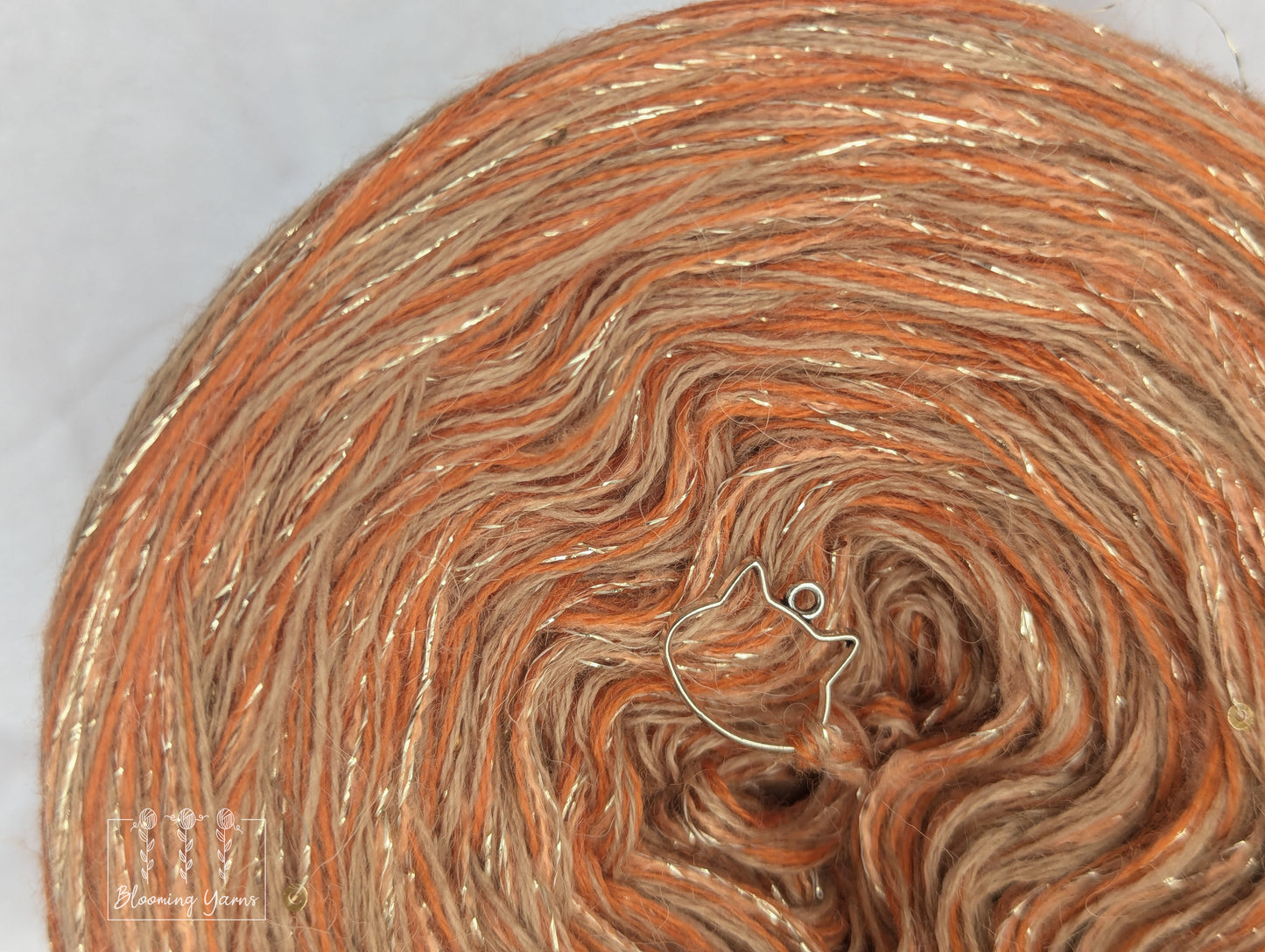 Melange yarn cake with additional mohair thread with lurex and sequins MMA01