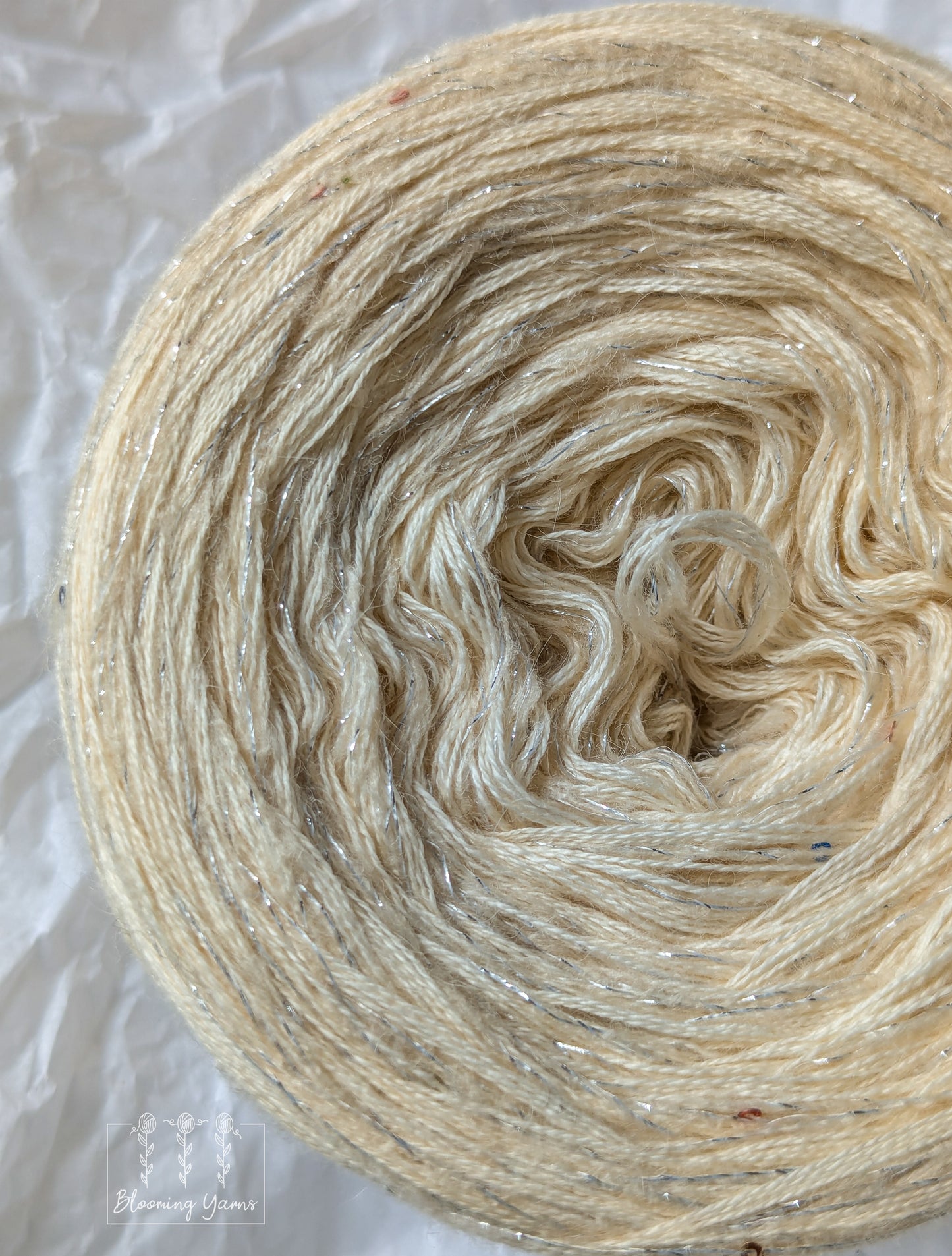 Cotton/merino yarn cake with additional mohair thread with lurex and sequins CMW020