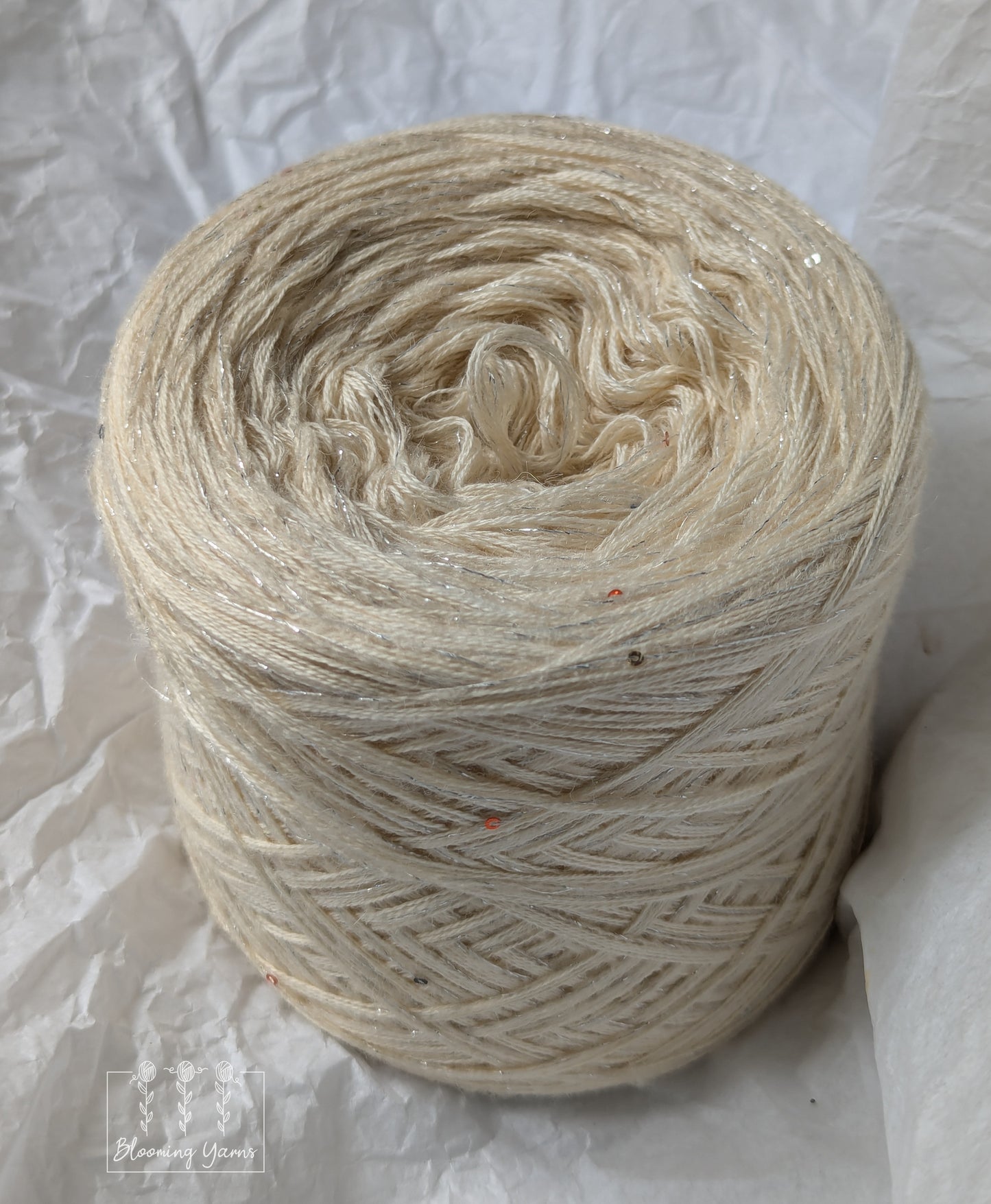 Cotton/merino yarn cake with additional mohair thread with lurex and sequins CMW020