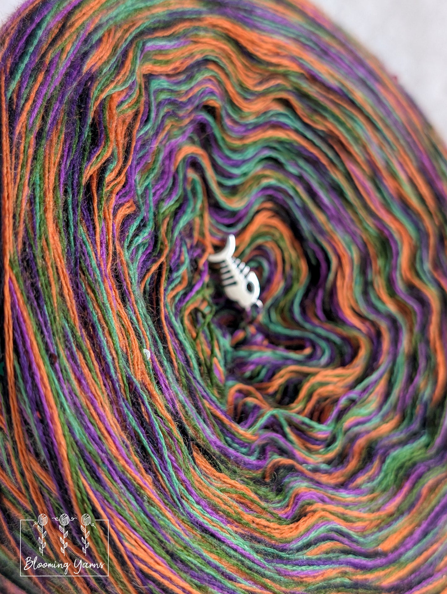Melange merino/acrylic blend yarn cake with sequins MA027