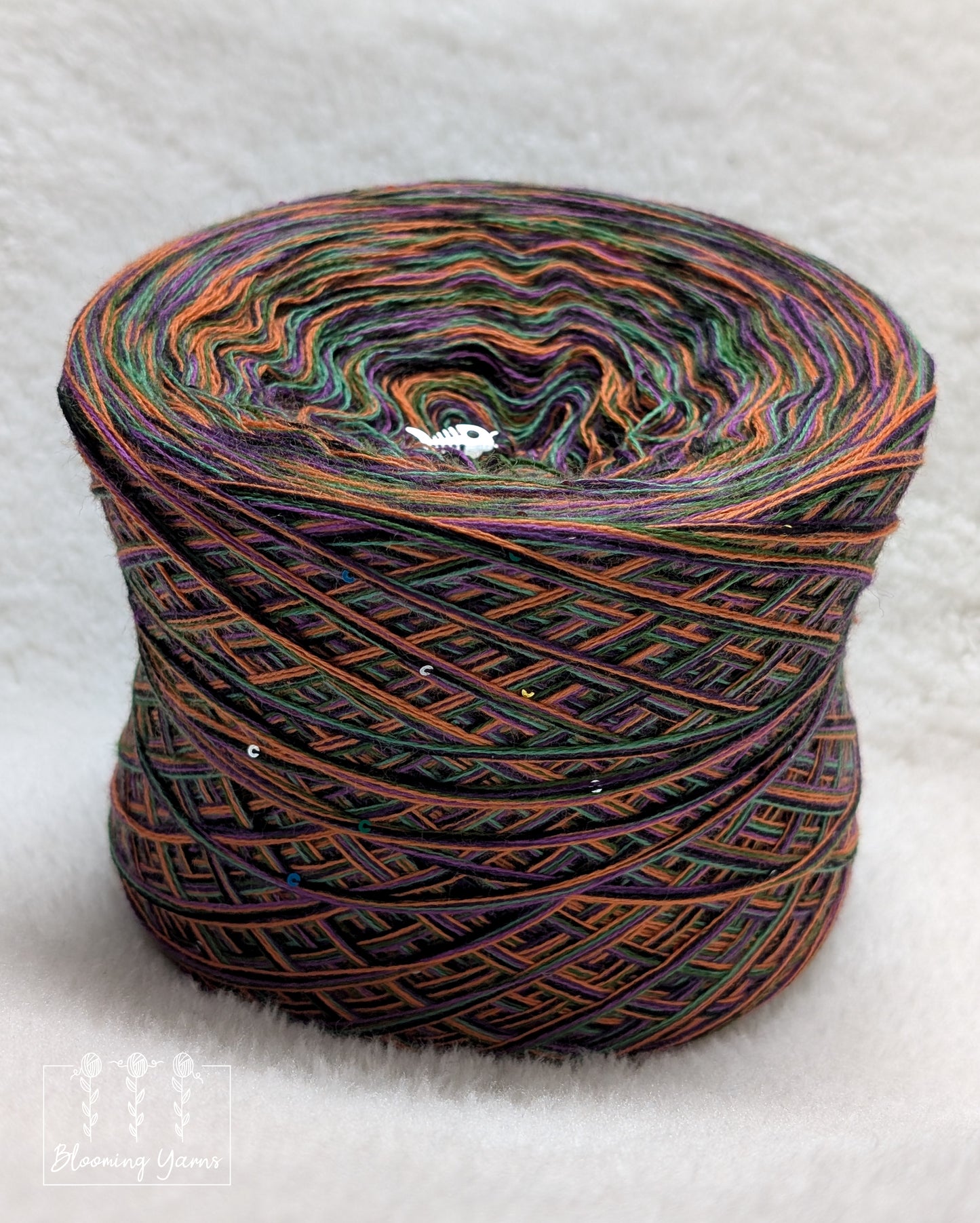 Melange merino/acrylic blend yarn cake with sequins MA027