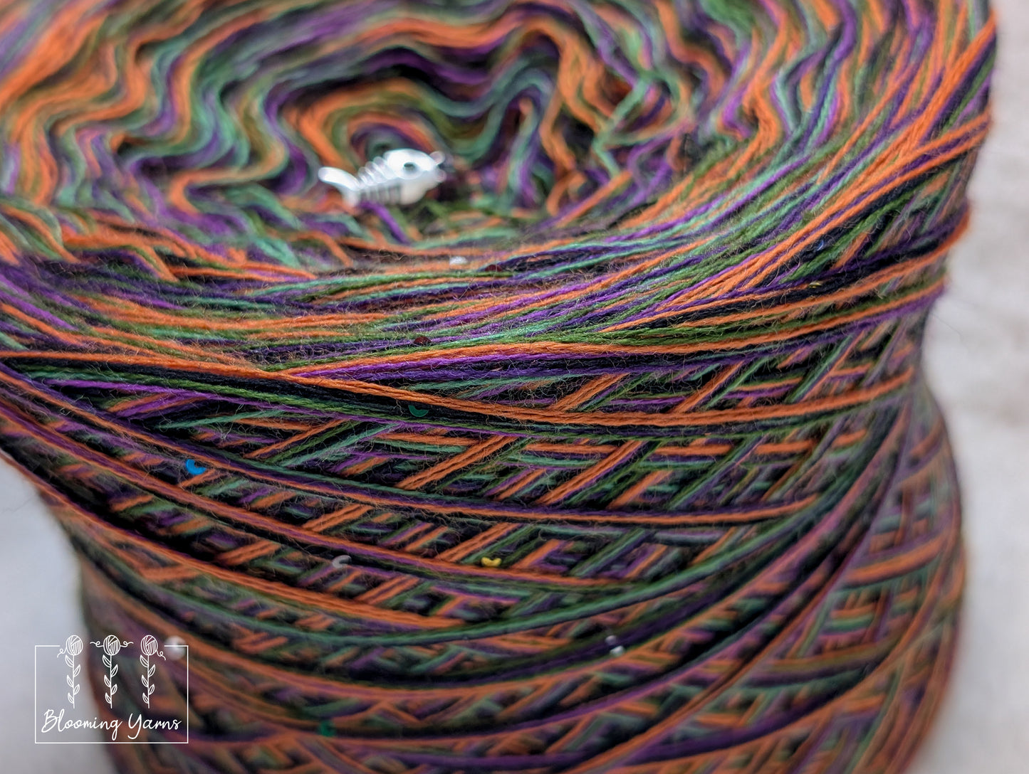 Melange merino/acrylic blend yarn cake with sequins MA027