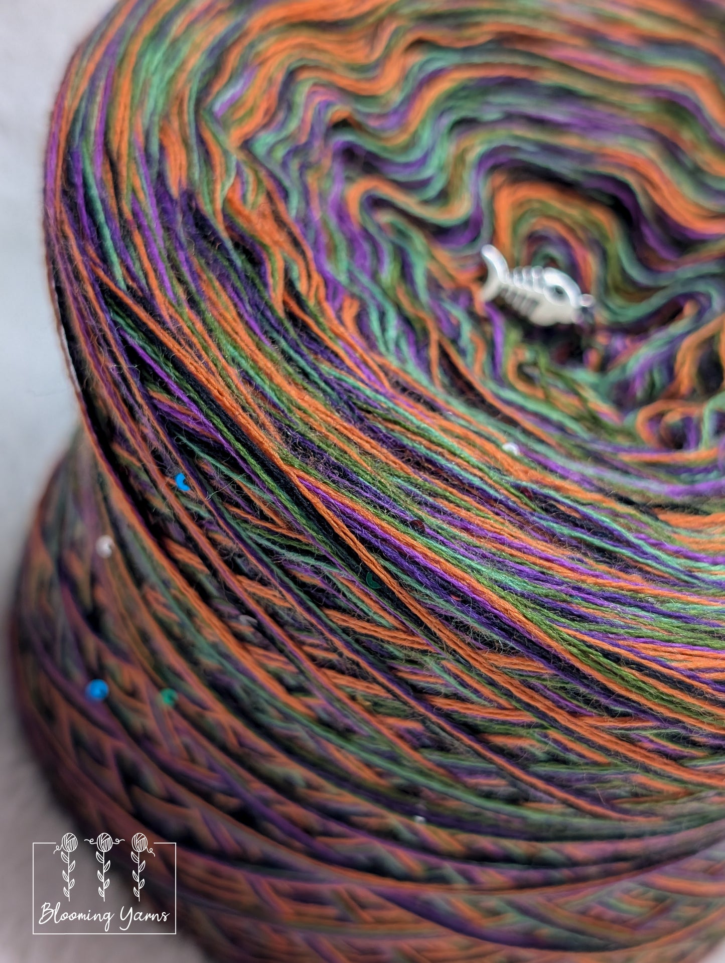 Melange merino/acrylic blend yarn cake with sequins MA027