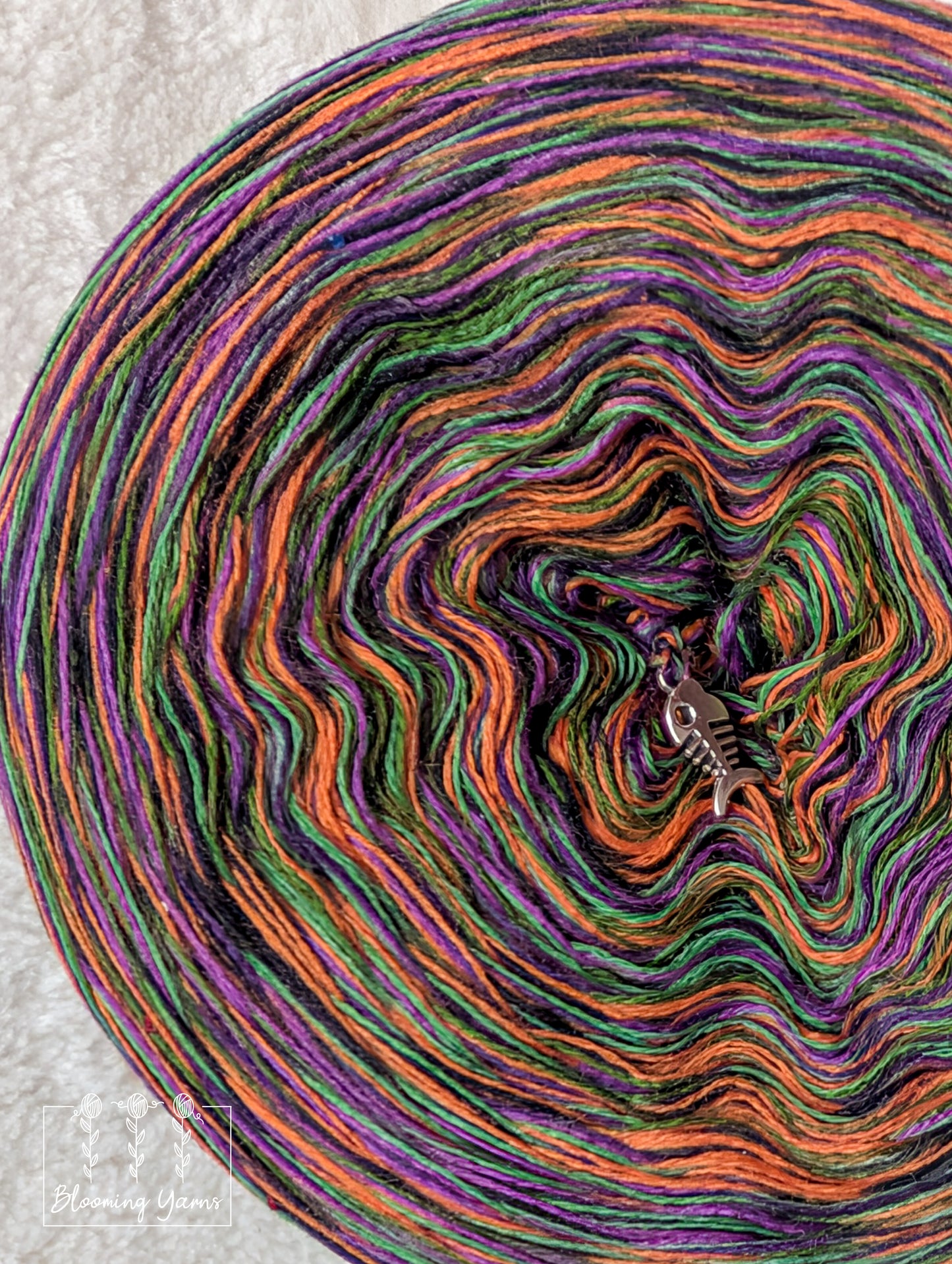 Melange merino/acrylic blend yarn cake with sequins MA027