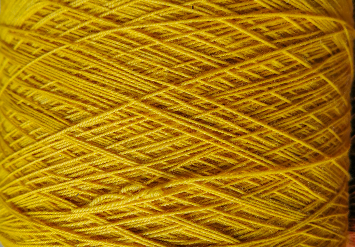 wool/nylon blend yarn in bright mustard